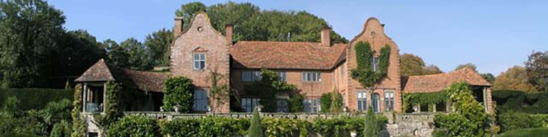 Port Lympne Designed for Sir Philip Sassoon by Baker and Wilmott in 1912 the house was originally called Belcaire but was renamed with reference to the area's Roman name of Portus Lemanis. For more information on the history of the house see the DiCamillo Companion to British and Irish Country Houses http://www.dicamillocompanion.com/Houses_hgpm.asp?ID=5647.