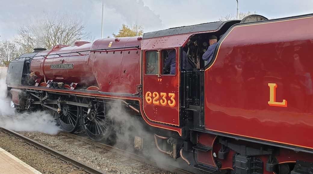 Duchess of Sutherland steam engine passes through.