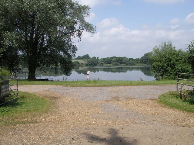 Entrance to Ringstead Grange Trout Fishery A very popular area for fishermen, a range of worked out sand and gravel pits have been given over to Fisheries and nature reserves.