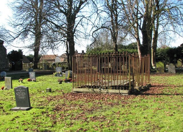 The church of St Mary in Middleton - fenced grave. For a view of the church which is situated in the adjoining grid square see > 1742635.