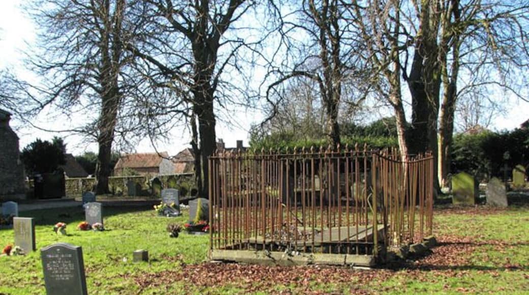 The church of St Mary in Middleton - fenced grave. For a view of the church which is situated in the adjoining grid square see > 1742635.