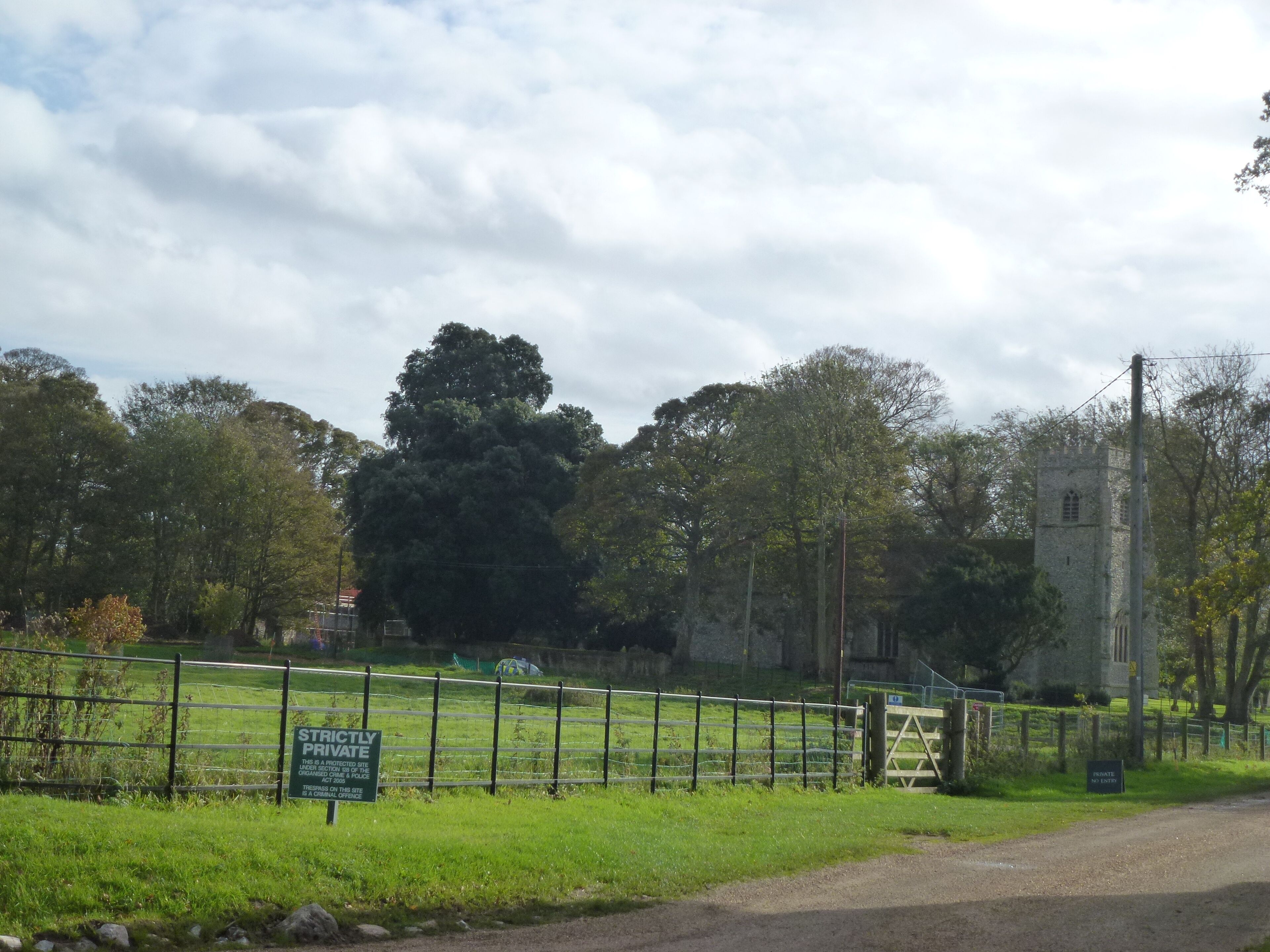 A fenced private property with a sign indicating restricted access.