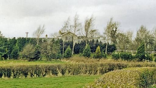 Site of Copgrove station, 1989. View westward to route of former ex-NER Knaresborough - Pilmoor branch. The station was closed with withdrawal of passenger services on the branch from 25/9/50, but goods traffic continued until 5/10/64.