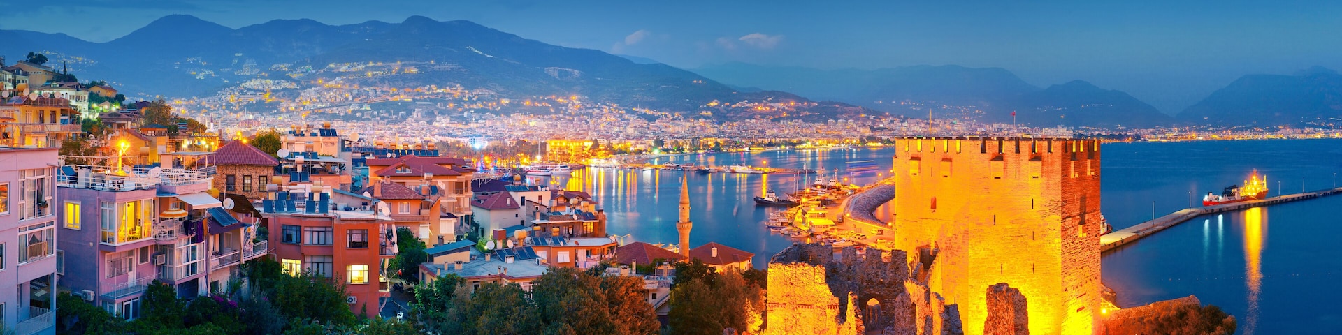 Panoramic view of Alanya harbour at night. Alanya, Turkey