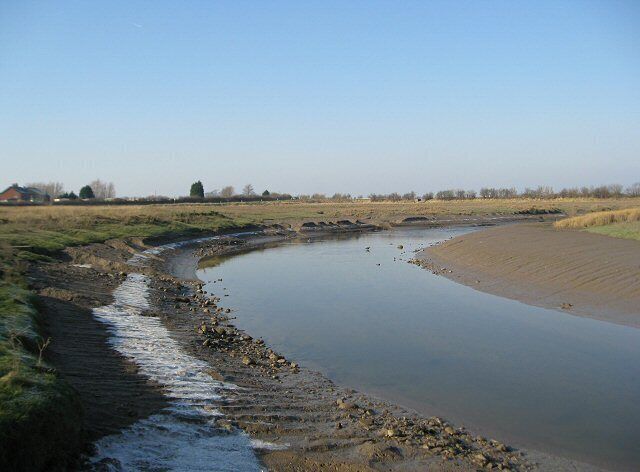 River Conder High tide left a rim of ice on the silty banks.