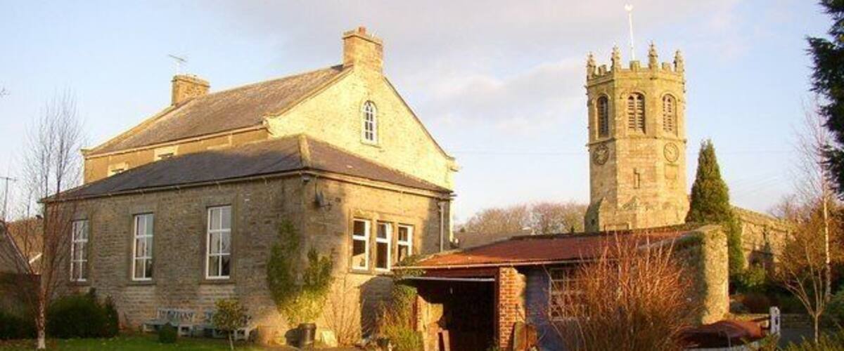 The rear of St Mary's RC Church, Hornby This is a simple dignified church; it is smaller than the presbytery behind. The tower belongs to St Margaret's Anglican church