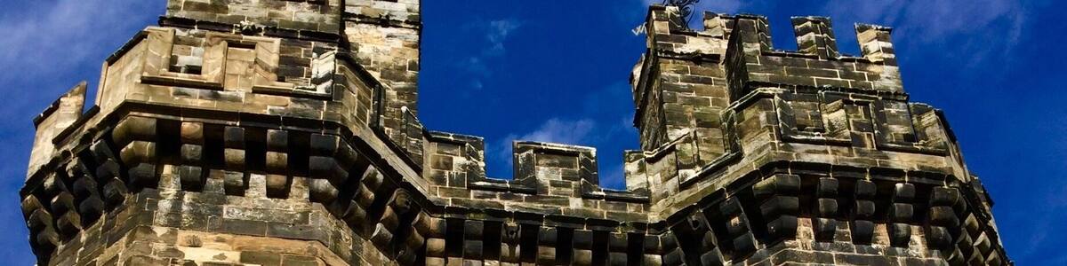 Lancaster Castle was used until a few years ago as one of HM Prisons. It is now open to the public and you can enter the cells and see where the Pendle Witches Trials took place in 1612.