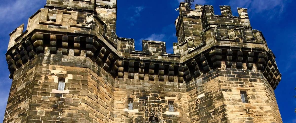 Lancaster Castle was used until a few years ago as one of HM Prisons. It is now open to the public and you can enter the cells and see where the Pendle Witches Trials took place in 1612.