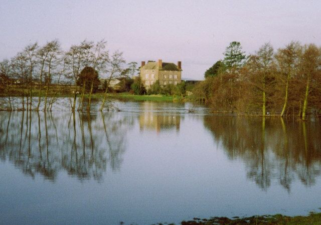 Wharton Court surrounded by flood water.
