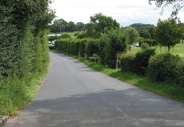 Road to Stoke Prior from Ford Bridge Leominster Golf Course on the right. There is a municipal course further along the road with 6 lane bowling alley.