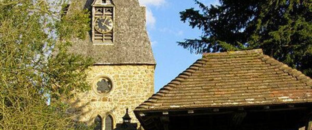 St Peter's Church, Chailey Taken from the west showing the lychgate. The tower dates from the 13th century but somehow the spire on top does not seem quite right.