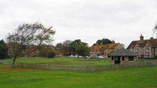 Recreation Ground Next to the cricket pitch with the cottages of Hampden Gardens beyond.