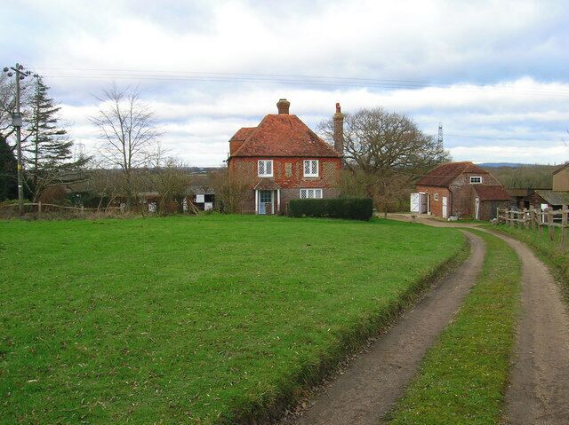 Upper Honeys Green Farm The footpath follows the track then turns right next to the barn.