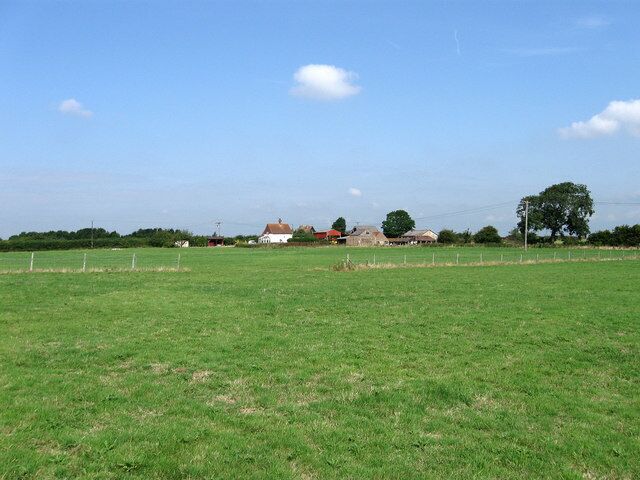 Footway Field The name of the field according to the 1839 tithe map. The name probably derives from an ancient public access route through the fields which still exists today as part of a footpath from Ham Lane to the A26 near The Cock. Ham Farm is in the distance.