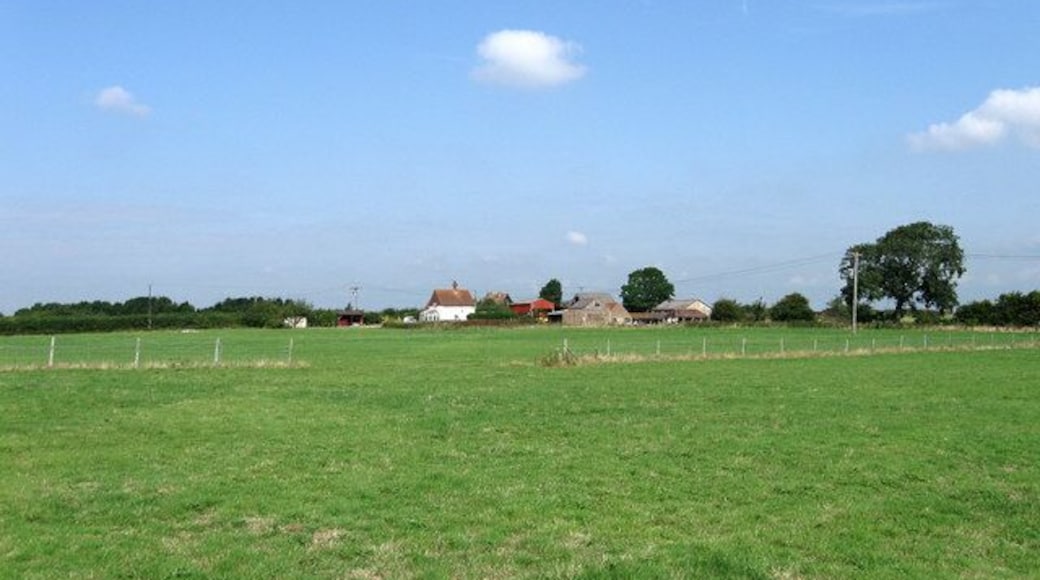 Footway Field The name of the field according to the 1839 tithe map. The name probably derives from an ancient public access route through the fields which still exists today as part of a footpath from Ham Lane to the A26 near The Cock. Ham Farm is in the distance.