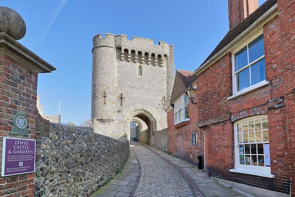 The entrance to Lewes Castle in East Sussex, England which stands at the highest point of the town on an artificial mound constructed with chalk blocks.
Built in 1069 by William de Warenne the first Earl of Surrey it is one of only two remaining that are based upon the motte and bailey construction.
Its open daily to the public and commands some great views across the countryside, including the Harvey's Brewery which is located in Lewes.