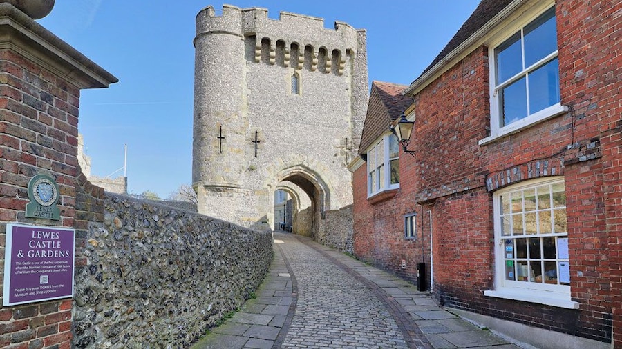 The entrance to Lewes Castle in East Sussex, England which stands at the highest point of the town on an artificial mound constructed with chalk blocks.
Built in 1069 by William de Warenne the first Earl of Surrey it is one of only two remaining that are based upon the motte and bailey construction.
Its open daily to the public and commands some great views across the countryside, including the Harvey's Brewery which is located in Lewes.
