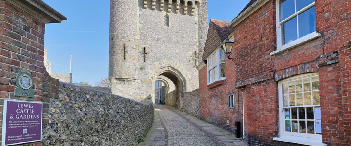 The entrance to Lewes Castle in East Sussex, England which stands at the highest point of the town on an artificial mound constructed with chalk blocks.
Built in 1069 by William de Warenne the first Earl of Surrey it is one of only two remaining that are based upon the motte and bailey construction.
Its open daily to the public and commands some great views across the countryside, including the Harvey's Brewery which is located in Lewes.