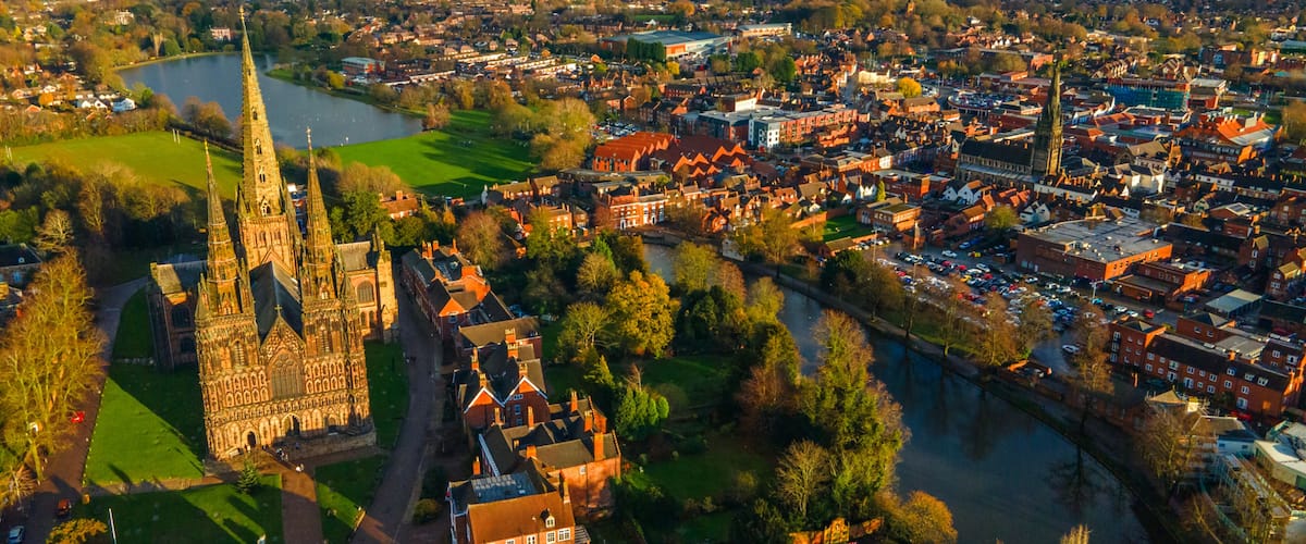 A cathedral, a river, and a densely built town.