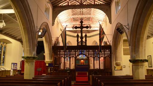 The church dates back to the 13th C. It has a western tower, nave with north and south aisles, the arcades of 3 bays are 13th Century, and chancel, vestry and porch. The tower was built in 1768. St Mary's was burnt down in 1442, the tower was rebuilt in 1768 and the body of the church in 1823 and it has not changed much since then. The east end is shaped like five sides of an octagon and is very unusual. A choir vestry was added in 1921 and was later extended to include kitchen and toilet facilities. During the building of the vestry it was discovered that the original body of the church went six feet further north. The church contains a hatchment, The Royal Coat of Arms of King George III dated 1838. At one time there was a gallery up against the west wall but it was removed in 1876 and at the same time the old box-pews were replaced with the present pine benches. The gallery would have been used for an orchestra up until 1851. In the north aisle there is a stained glass window by Burlison & Grylls commemorating Royal Air Force personnel who served in the First World War and another depicting Dr Richard Smith founder of Christ Hospital school in Lincoln. The chancel screen was erected in 1907 and the furninshings of the chancel and sanctuary are mainly as they were arranged in 1860. In the chancel are a couple of 17th century poppyhead pew ends brought to Welton from Norwich by Cannon Sutton of Brant Broughton. In the sanctuary the altar is of oak and stripped of it's hangings it looks like a large chest. The reredos was probably installed in 1888 and partly conceals the east windows which were installed by Rev W Williamson in 1855. The windows are memorials to Robert & Joanne Mawley of St Mary's, Alderney, in the City of London and Thomas Mawley, son of Sarah and Edward Westhall of Croydon, Surrey, The Welton connection is as yet unknown.