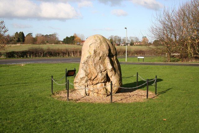 Millennium Stone, Sudbrooke. A glacial erratic of the Jurassic period from North Yorkshire, deposited here some 300,000 years ago, and donated to this site by the Massey family in 2000