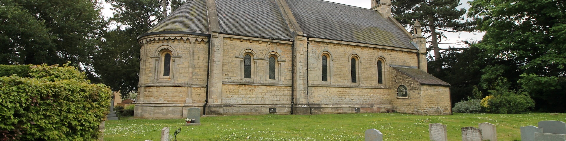 There is evidence from 1271 that there was a church before the current one. The previous one was built in red brick, fell into disrepair and was demolished. The church was built in 1860 by John Dobson. There is a nave with western bellcote with one bell, chancel with apsoidal sanctuary, south porch, and north vestry. The whole church is built in the Norman revival style. Externally, the apse has a corbel table of carved heads, and there are chevron and dogtooth decorations around the windows. Inside there is a ribbed vault to the apse. The south porch doorway is surrounded by beak heads and dogtooth mouldings. The nave roof is a crown post type. The font and pulpit are neo Norman. At the west end there are two memorial slabs, one from the 17th century and the other from the 18th century. There is a single manual organ by Forster and Andrews from 1864, which was restored in 1970. Pic by Jenny.