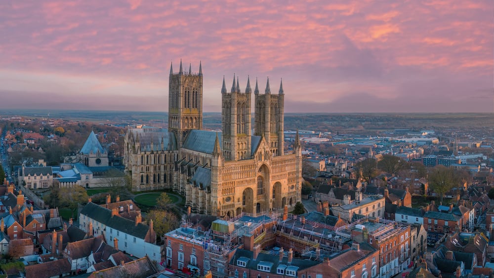 Lincoln, UK. Cathedral and City at sunset. Aerial view of the British city of Lincoln United Kingdom. Steep Hill and historic church