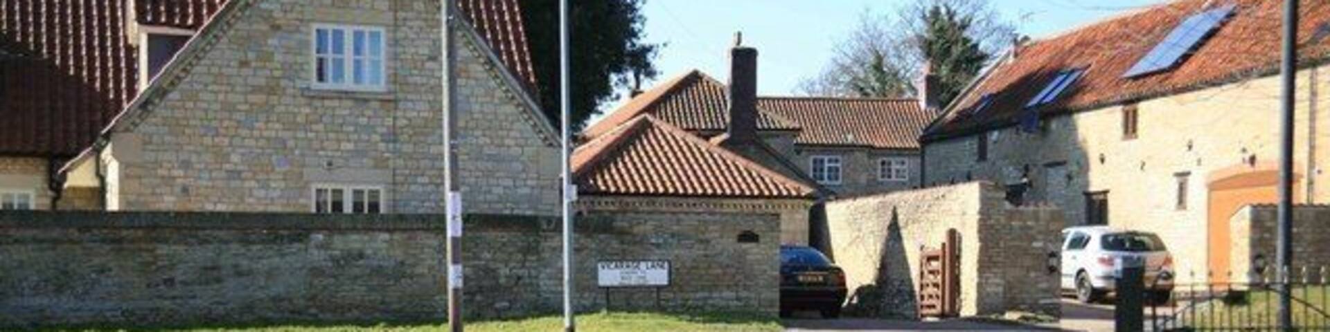 Vicarage Lane by the Church Dunston. Some modern houses here but they look good.