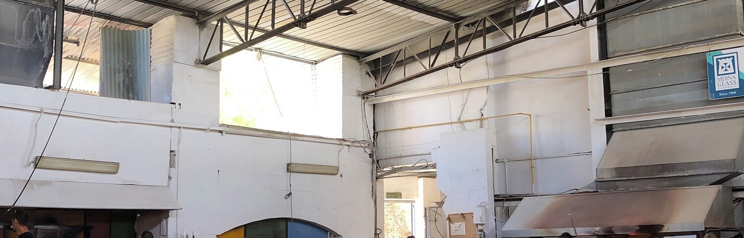 View from inside the Mdina Glass glassblowing studio in the country of Malta. Dating from 1968, this studio was the first glassblowing studio ever in Malta.