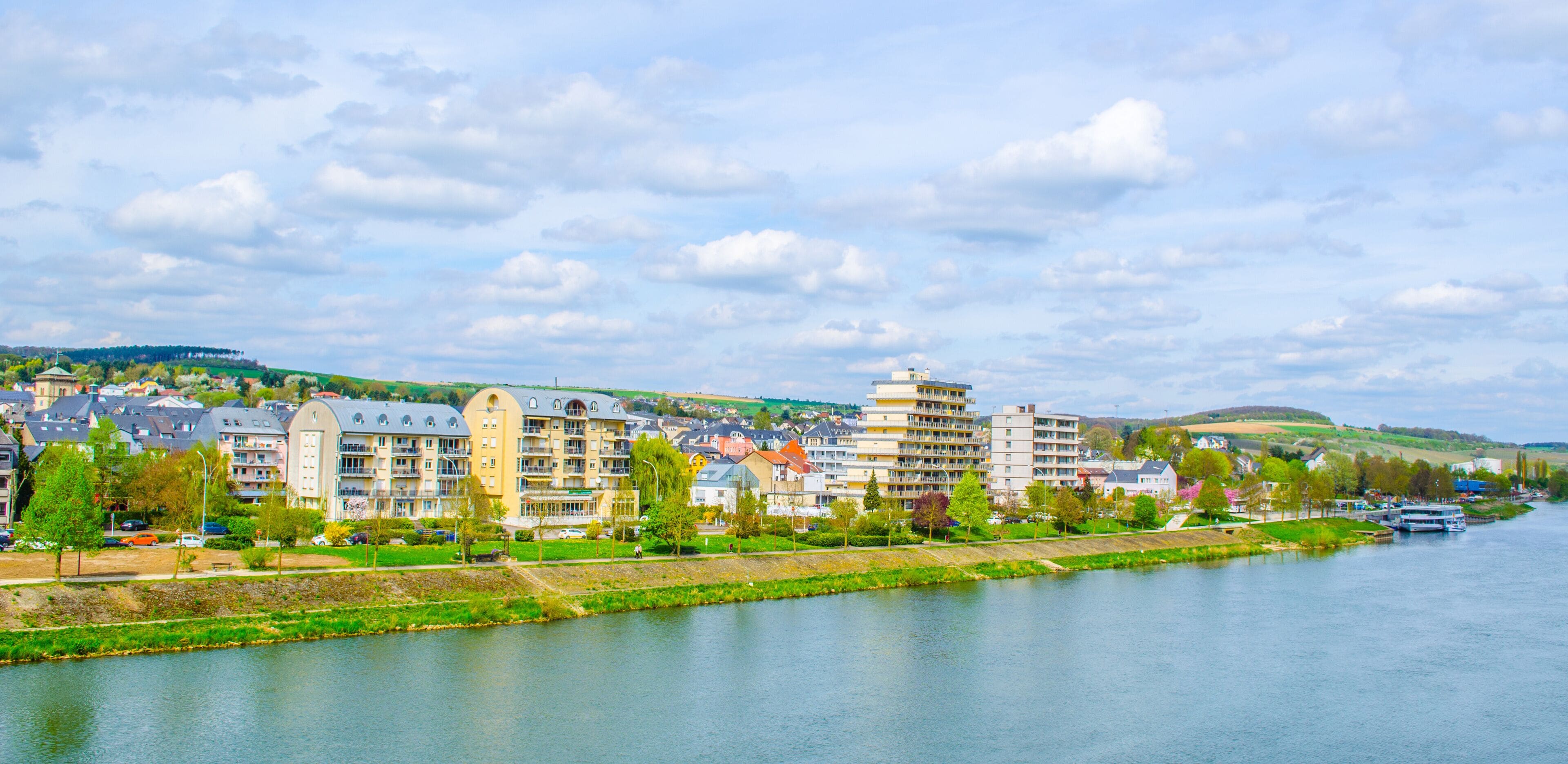 Moselle river flowing through wine heart of luxembourg and passing many small villages.