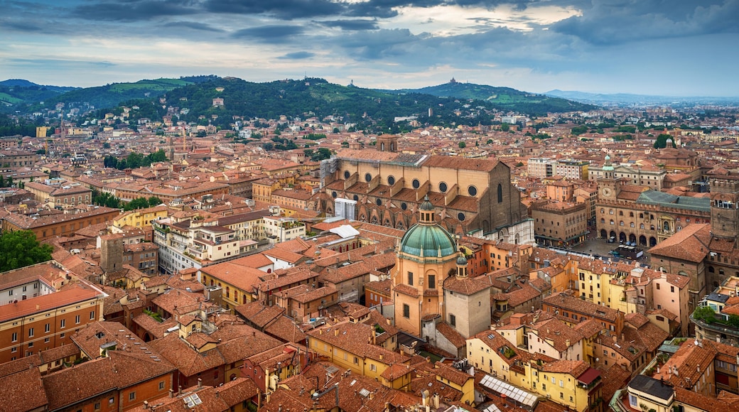 Panorama of the Bologna city in Italy in a summer cloudy day. View from the Asinelli tower.