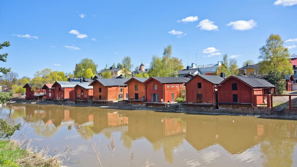 Finland, Southern Finland, Porvoo, red-ochre painted shore houses, riverside storage buildings