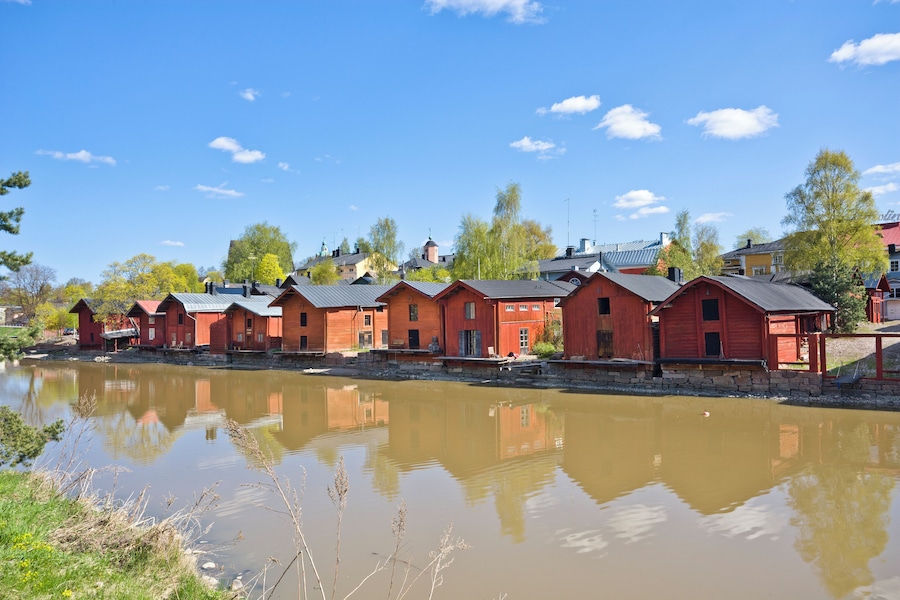 Finland, Southern Finland, Porvoo, red-ochre painted shore houses, riverside storage buildings