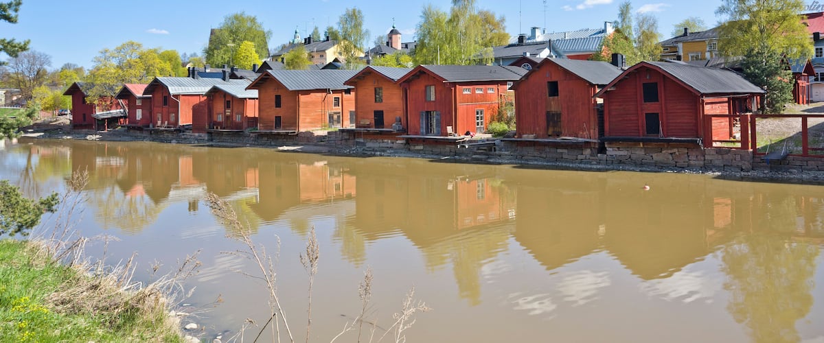 Finland, Southern Finland, Porvoo, red-ochre painted shore houses, riverside storage buildings