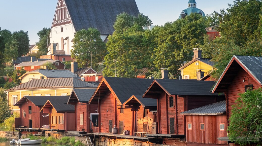 Beautiful city landscape with idyllic river and old buildings at summer evening in Porvoo, Finland