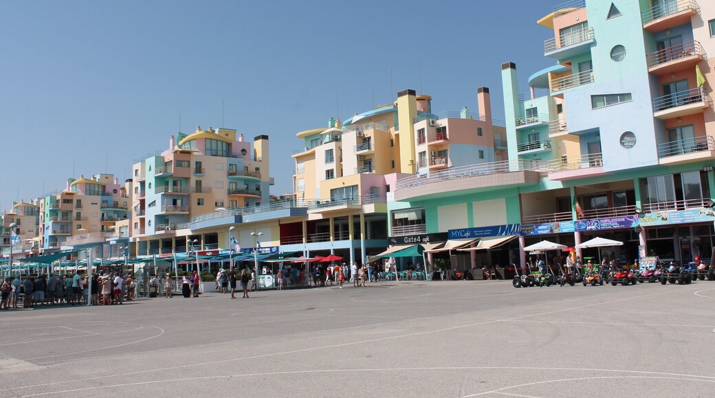 Beautiful pastel coloured buildings in front of the marina.