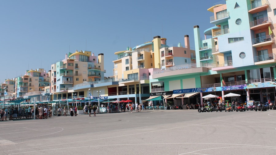 Beautiful pastel coloured buildings in front of the marina.