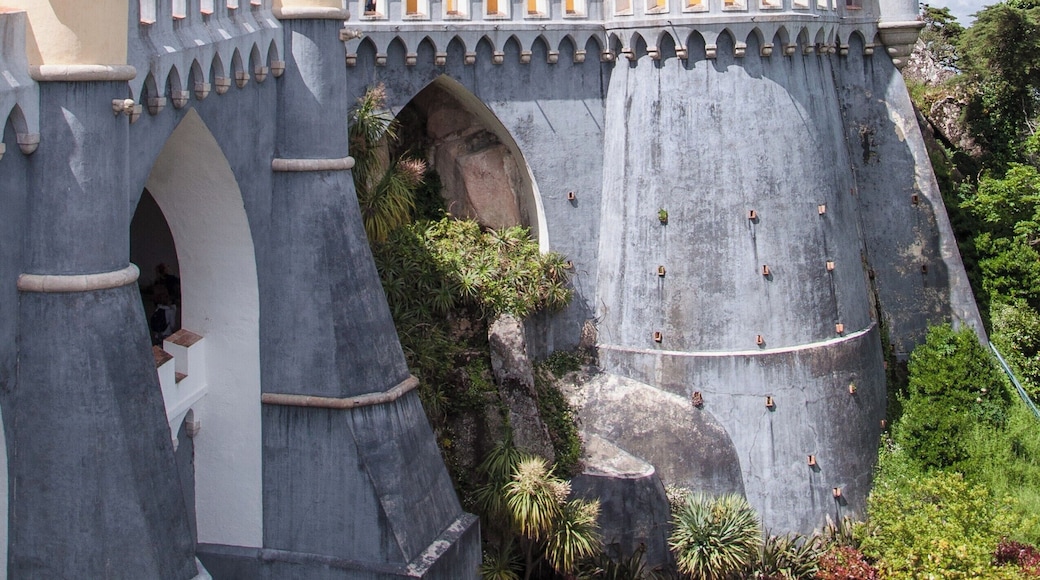 The Pena Palace (Portuguese: Palácio da Pena) is a Romanticist castle in the municipality of Sintra, Portugal. It is a national monument and constitutes one of the major expressions of 19th-century Romanticism in the world. The palace is a UNESCO World Heritage Site and one of the Seven Wonders of Portugal.