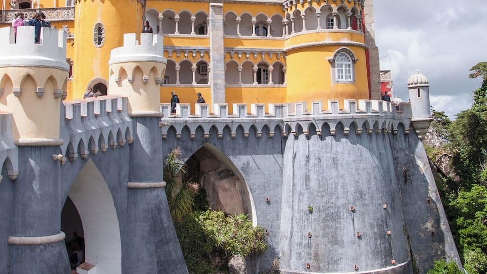 The Pena Palace (Portuguese: Palácio da Pena) is a Romanticist castle in the municipality of Sintra, Portugal. It is a national monument and constitutes one of the major expressions of 19th-century Romanticism in the world. The palace is a UNESCO World Heritage Site and one of the Seven Wonders of Portugal.
