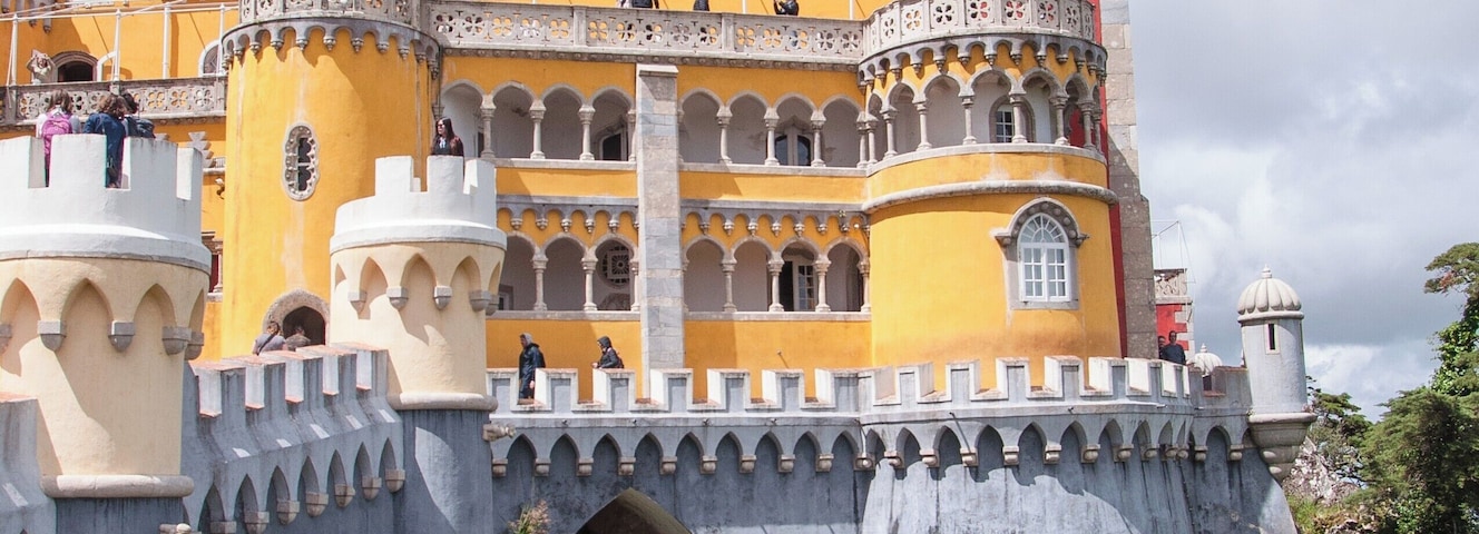 The Pena Palace (Portuguese: Palácio da Pena) is a Romanticist castle in the municipality of Sintra, Portugal. It is a national monument and constitutes one of the major expressions of 19th-century Romanticism in the world. The palace is a UNESCO World Heritage Site and one of the Seven Wonders of Portugal.