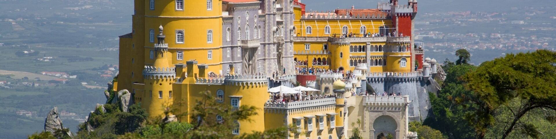 If you visit Sintra, Portugal, be sure to visit Palacio Pena. The walk leading up to the palace is just stunning.