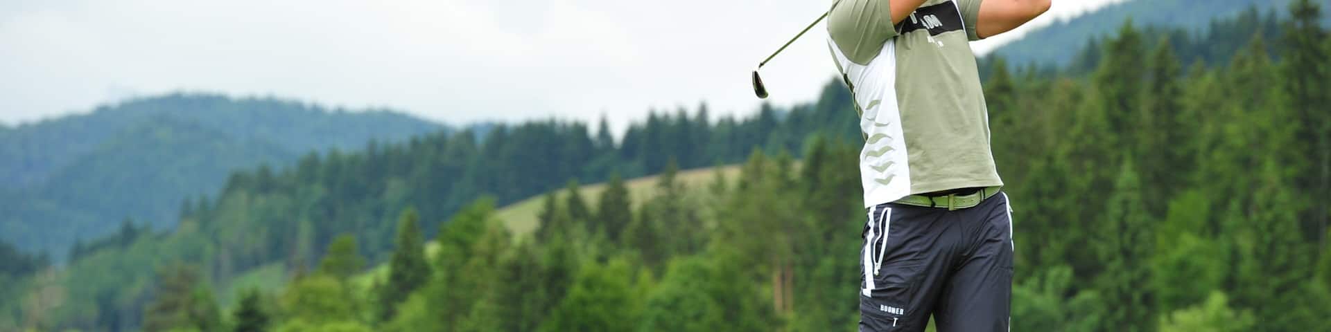 Ellmau showing golf as well as an individual male