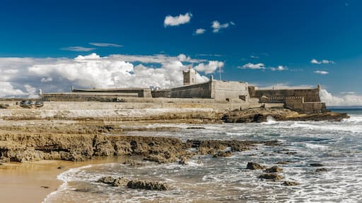 The San Julian (São Julião) lighthouse, located in the fort of the same name, and situated on a headland on the north bank of the River Tagus estuary in Oeiras, Lisbon District, Portugal.
