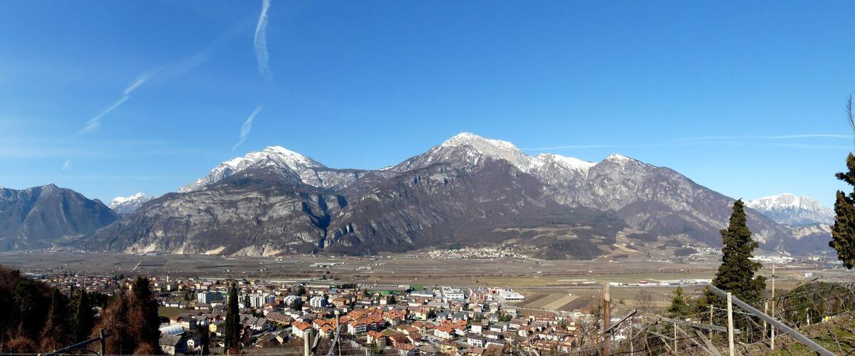 Trento (Italy): panorama of the village of Mattarello from east. On the background, mount Bondone.