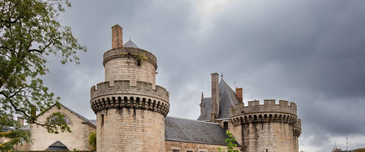 A tranquil view of Le Château des Ducs from Parc Simone Veil (cours du château des Ducs) in Alençon, Normandy, France