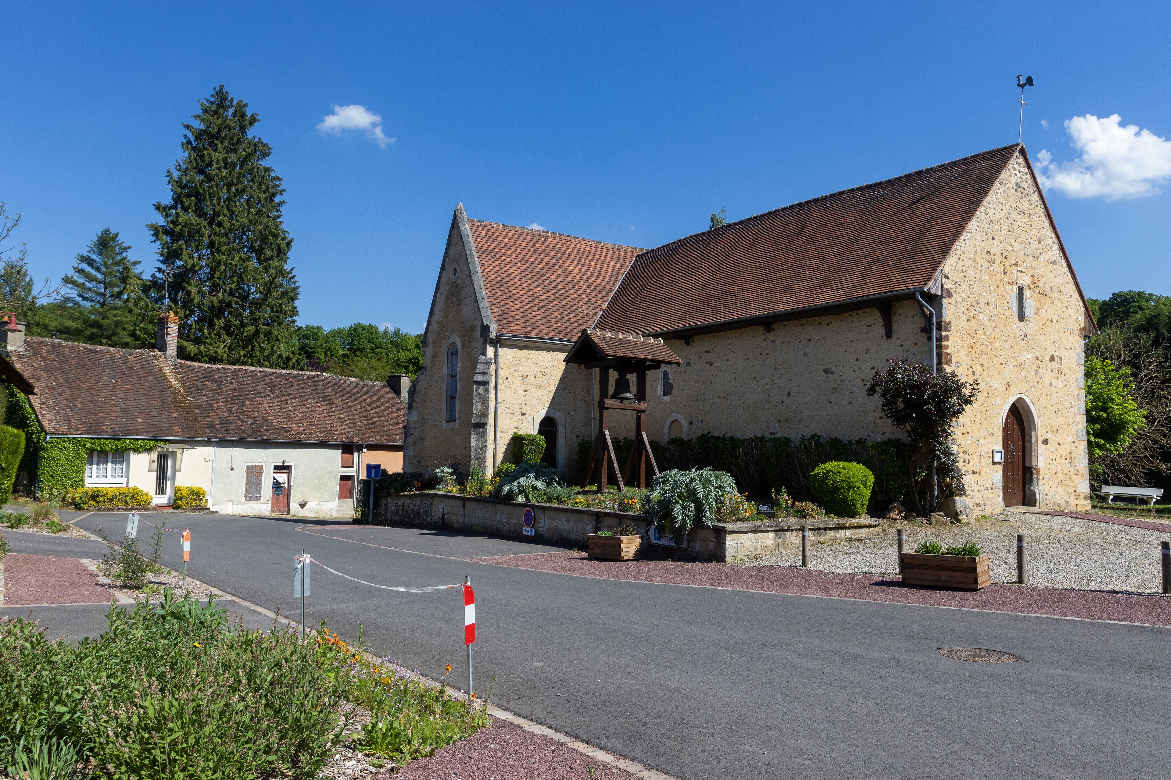 The beautiful French village and church of Saint-Rigomer-des-Bois, near Alencon in Sarthe, France.