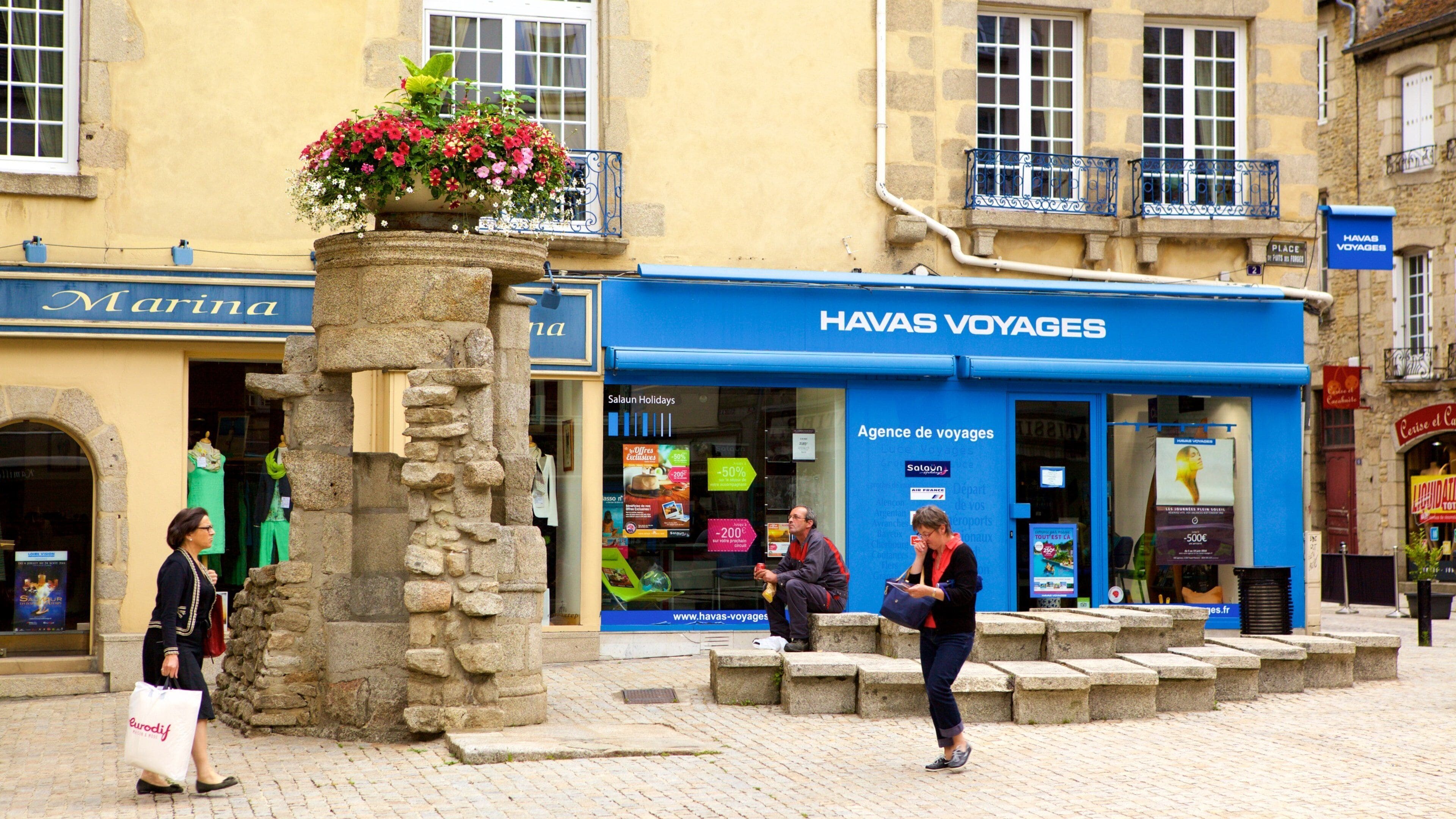 Alencon which includes signage and a city