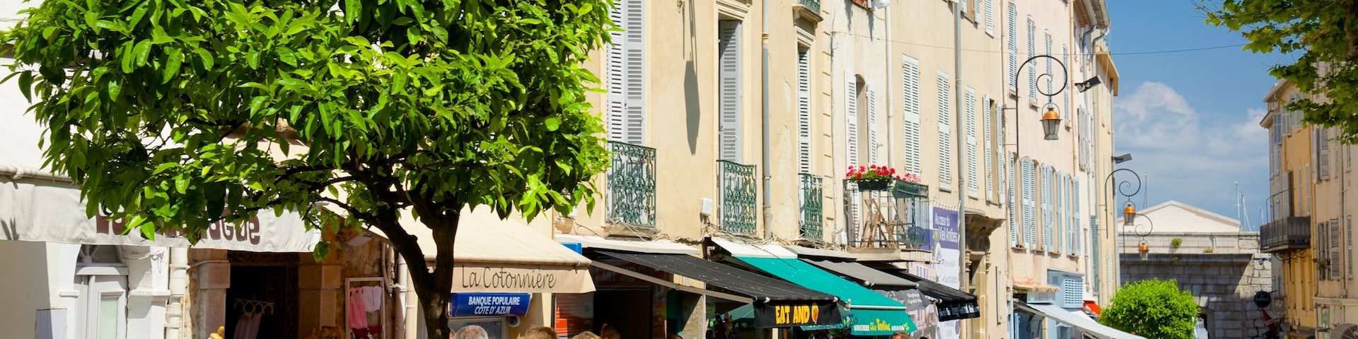 Antibes showing a city and street scenes as well as a large group of people