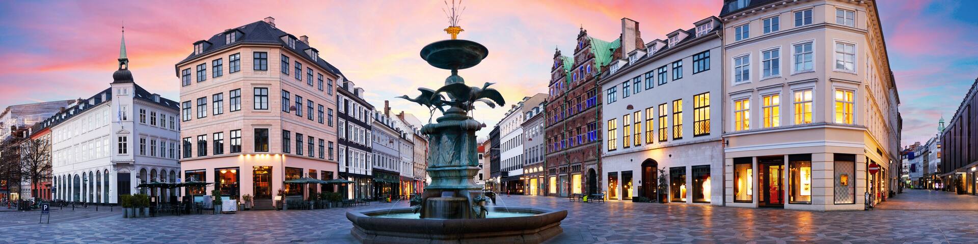 Stork Fountain on the Amagertorv (Amager Square) and the longest pedestrian street in the world Stroget in Copenhagen Denmark.