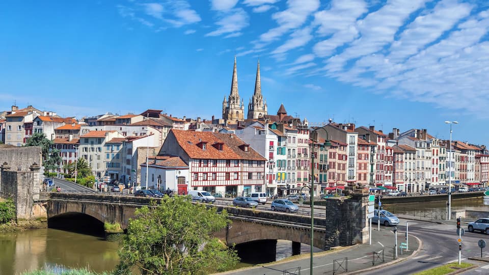 Panorama of Bayonne with bridge Pont du Genie across the Nive river on the front view, Aquitaine, France